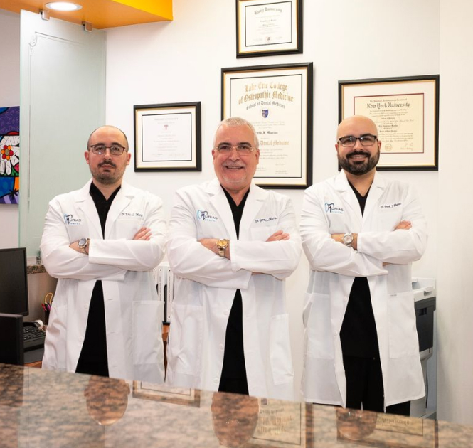 Murias Dental team of Dr. German Murias, Dr. Eric Murias, and Dr. Frank Murias at clinic in Hialeah and Plantation, FL