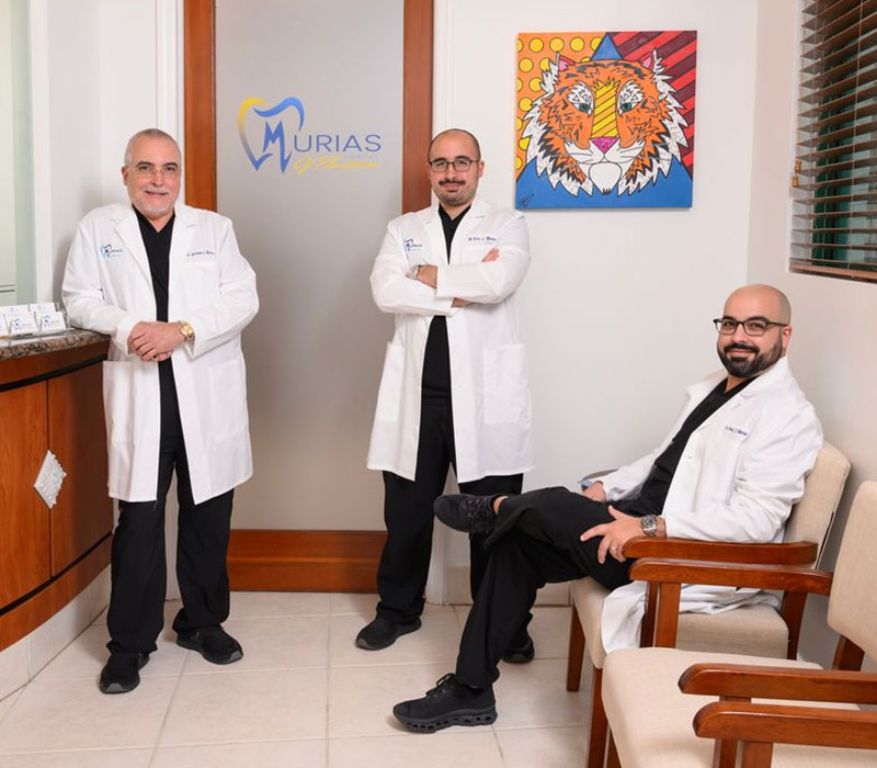 Murias Dental team of Dr. German Murias, Dr. Eric Murias, and Dr. Frank Murias at clinic in Hialeah and Plantation, FL